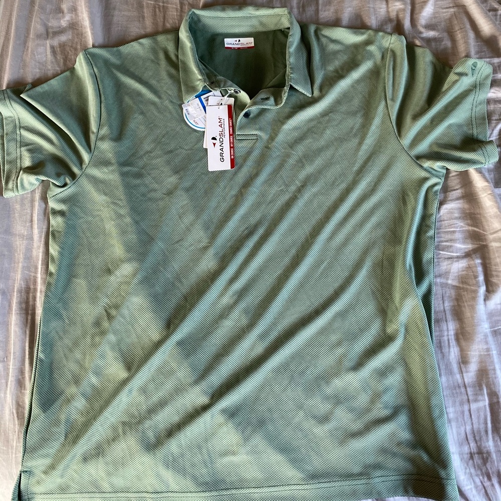 NWT men’s Grand Slam shirt.